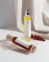 Henua Skincare products on a white surface with a neutral background